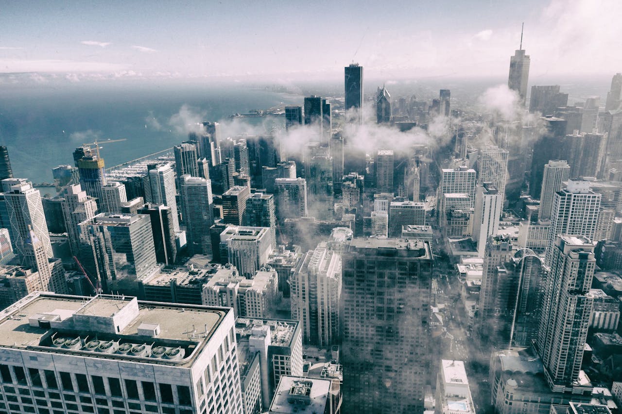 Overhead drone shot of city with clouds